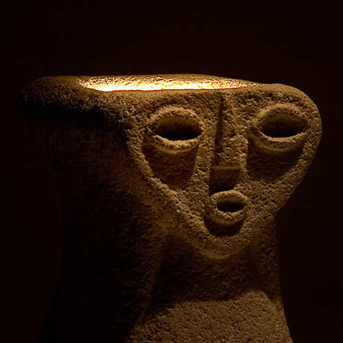 Anthropomorphic stone lamp